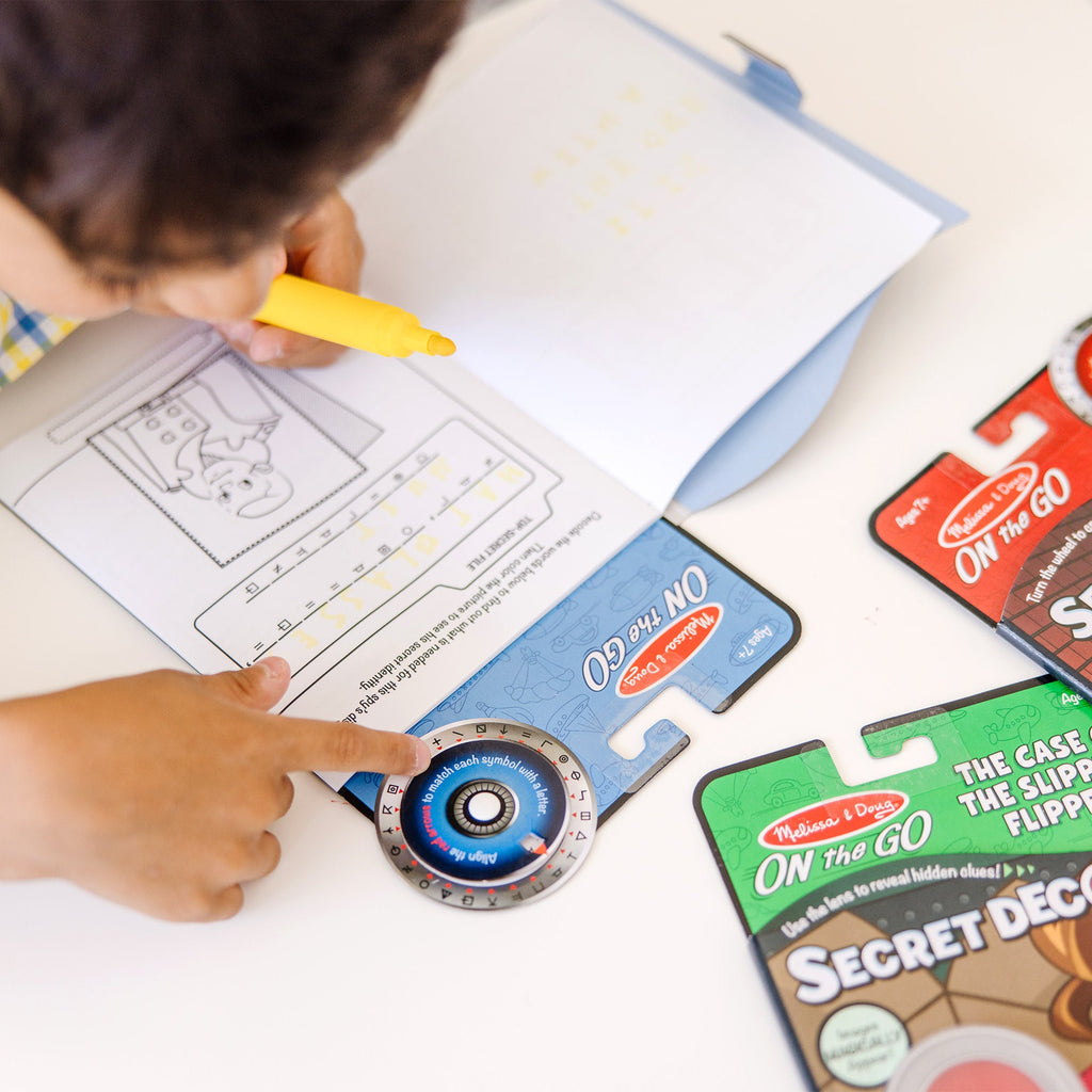 On the Go™ Secret Decoder Activity Books 3-Pack: Slippery Flippers Runaway Ruby Game Book